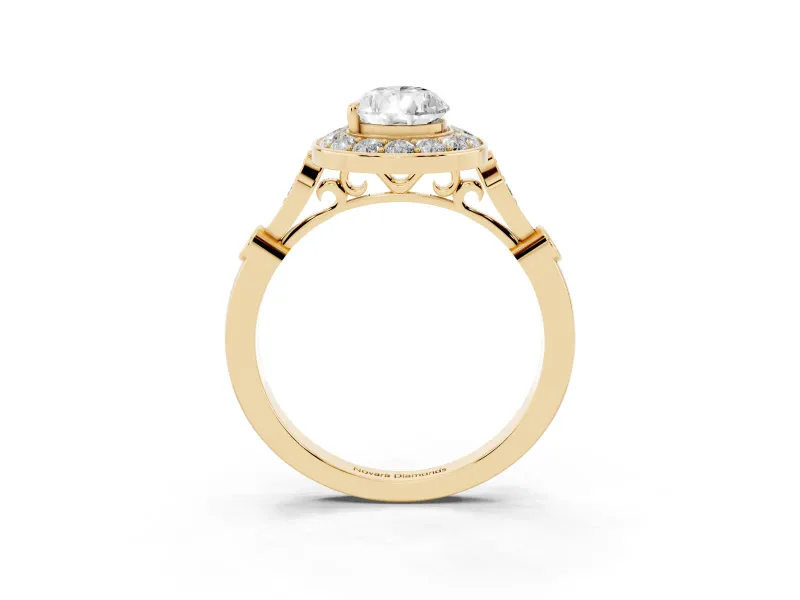 Pear Cut Diamond Halo Engagement Ring Set in Yellow gold with Twisted Band and Prong Setting