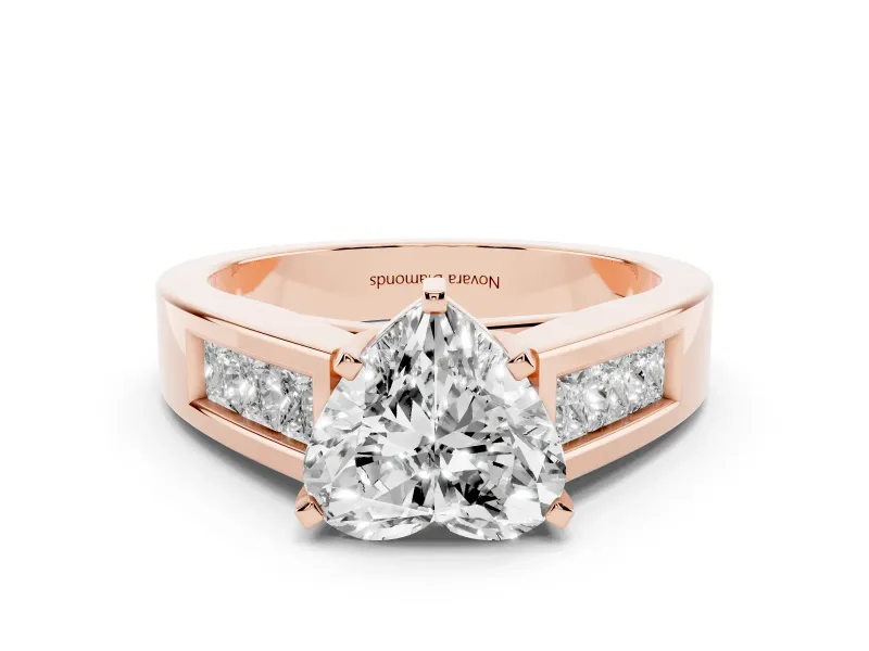 Heart Cut Diamond Solitaire Ring Set in Rose gold with Channel-Set Accent Stones and Prong Setting