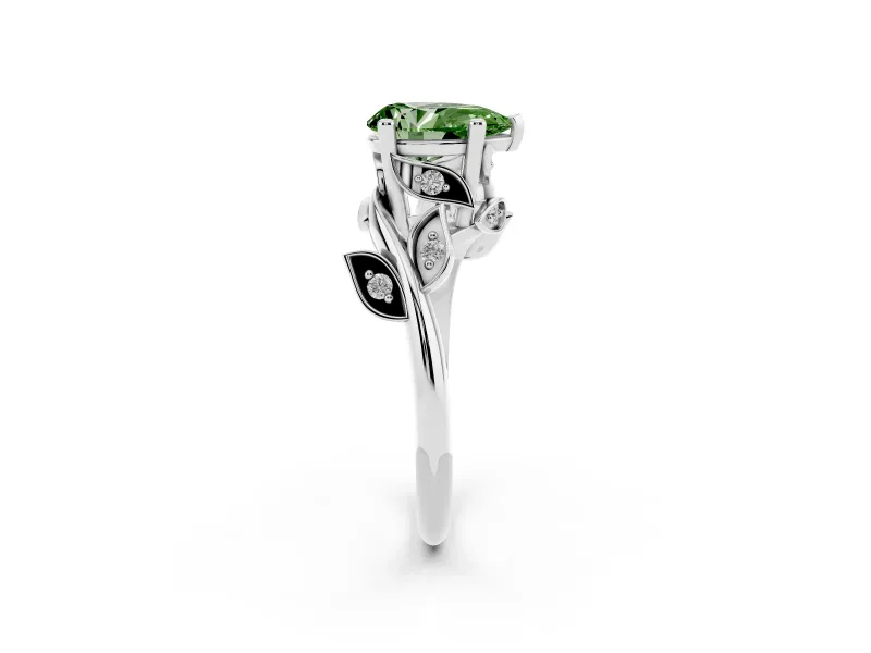 Fancy Green Pear Cut Diamond Solitaire Twist Engagement Ring Set in White gold with Pavé Leaf Accents