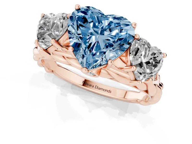 Heart-Shaped Three Stone Engagement Ring Setting for a Fancy Blue Lab-Grown Diamond | Braided Band | Rose Gold