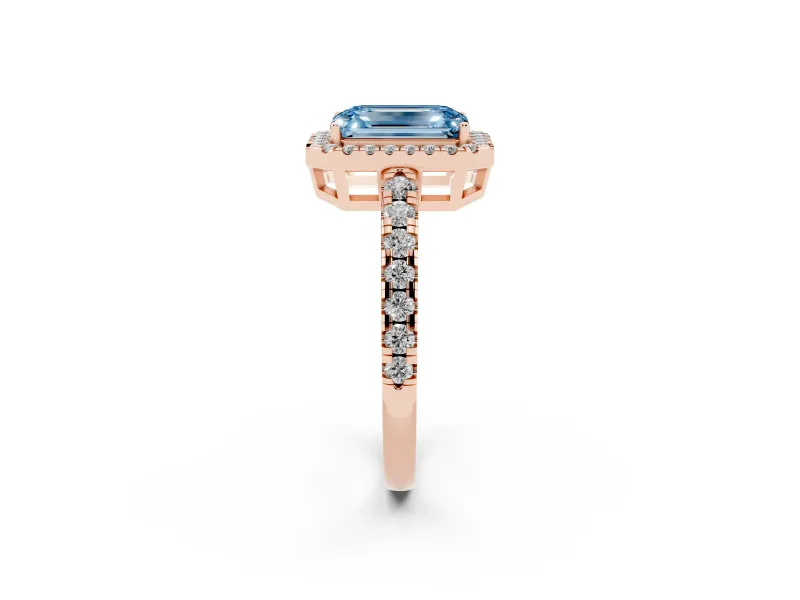 Fancy Blue Emerald Cut Diamond Halo Ring Set in Rose gold with Delicate Pavé Band and Prong Setting