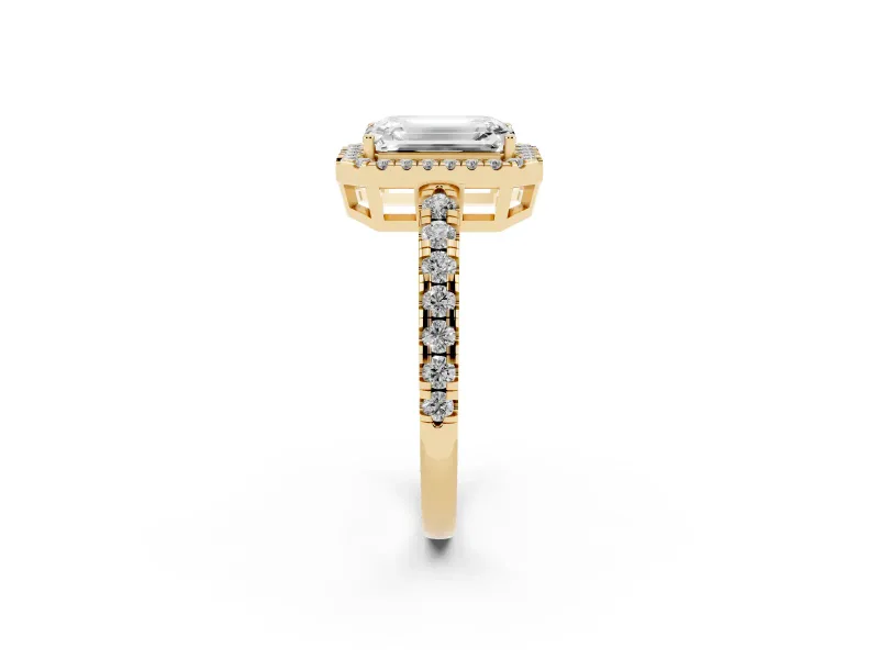 Emerald Cut Diamond Halo Ring Set in Yellow gold with Delicate Pavé Band and Prong Setting