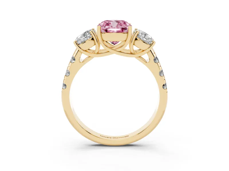 Fancy Pink Cushion Cut Diamond Three-Stone Ring Set in Yellow gold with Pavé Band