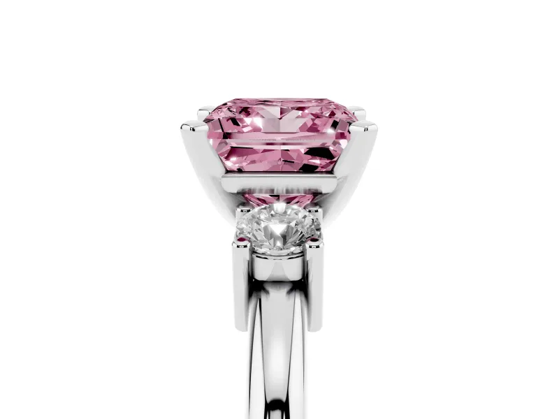 Fancy Pink Three-Stone Princess Cut Diamond Ring Set in Platinum with Prong Setting and Plain Band