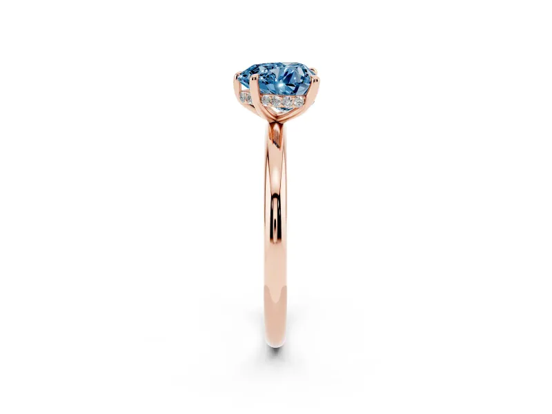 Fancy Blue Heart Cut Diamond Solitaire Ring Set in Rose gold with Thin Band and Prong Setting
