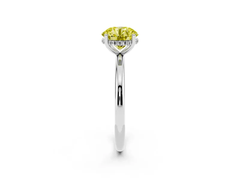 Fancy Yellow Round Cut Diamond Solitaire Engagement Ring Set in Silver with Prong Setting and Polished Band