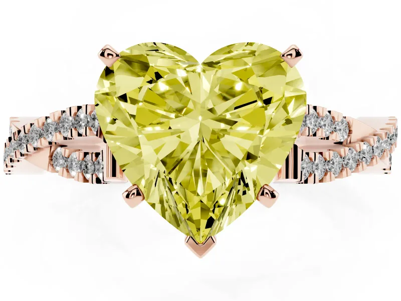 Fancy Yellow Heart Cut Diamond Solitaire Engagement Ring Set in Rose gold with Twisted Pavé Band and Prong Setting