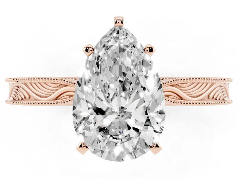 Pear Cut Diamond Solitaire Milgrain Engraved Band Set in Rose gold with Prong Setting