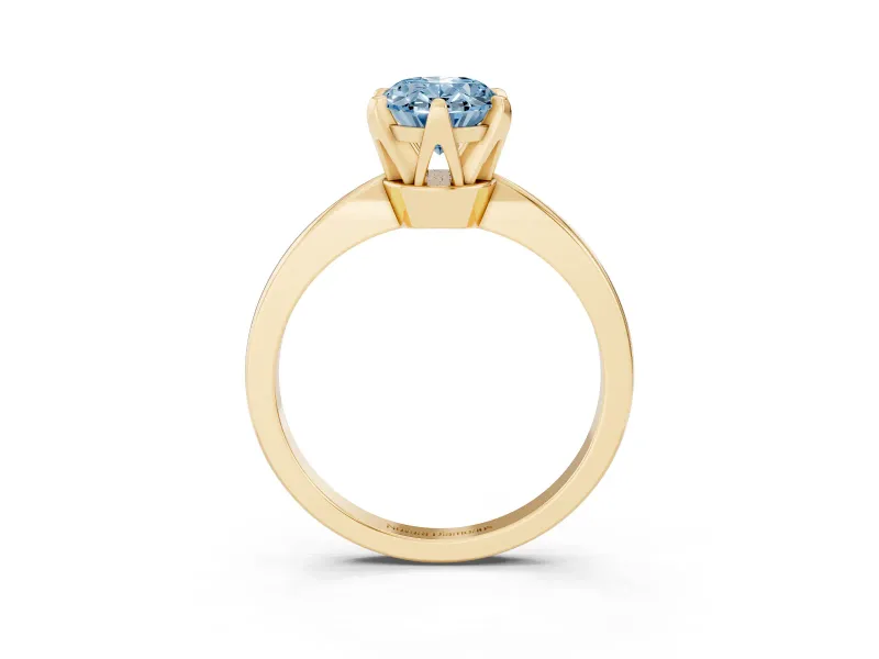 Fancy Blue Oval Cut Diamond Solitaire Engagement Ring Set in Yellow gold with Slim Tapered Solitaire Band