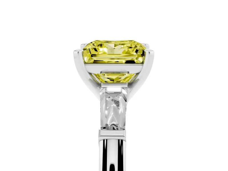 Fancy Yellow Princess Cut Diamond Solitaire Ring Set in Platinum with Tapered Baguette Side Stones and Prong Setting