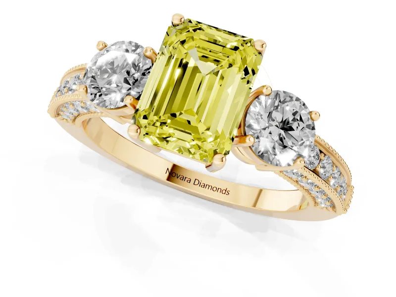 Fancy Yellow Emerald Cut Diamond Three-Stone Ring Set in Yellow gold with Round Side Stones and Pavé Band