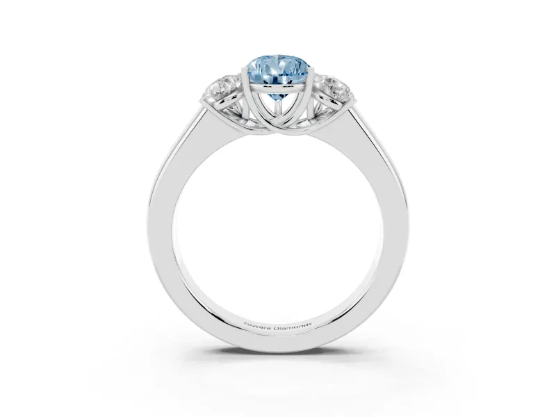 Fancy Blue Three-Stone Pear Cut Diamond Ring Set in White gold with Matching Prong Settings and Plain Band