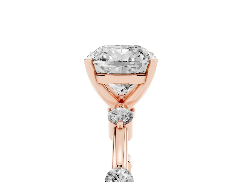 Cushion Cut Diamond Solitaire Ring Set in Rose gold with Bezel Set Side Stones and Prong Setting