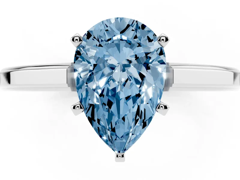 Fancy Blue Pear Cut Diamond Solitaire Ring Set in White gold with Prong Setting and Classic Band