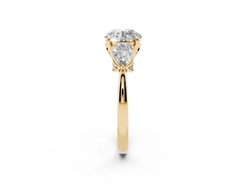 Round Three Stone Engagement Ring Setting | Pear Side Stones | Yellow Gold