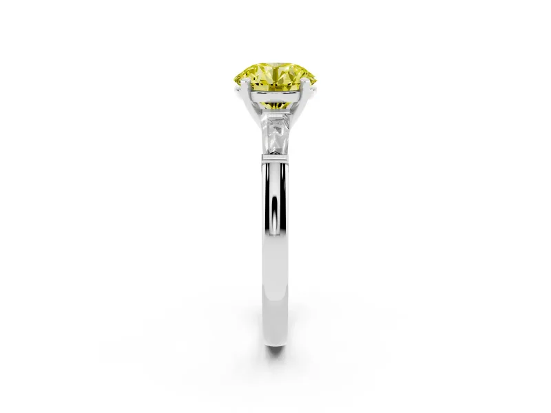 Fancy Yellow Round Cut Diamond Solitaire Ring Set in Platinum with Tapered Baguette Side Stones and Prong Setting