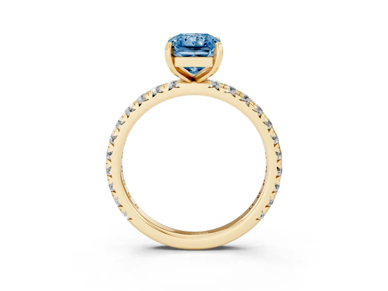 Fancy Blue Radiant Cut Diamond Pavé Solitaire Ring Set in Yellow gold with Round Band and Prong Setting