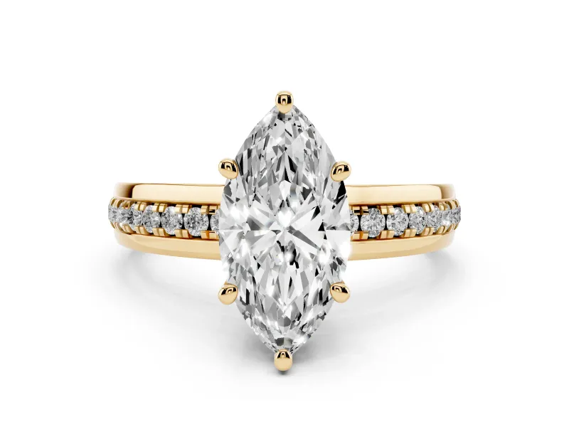 Marquise Cut Diamond Solitaire Ring Set in Yellow gold with Channel Set Band and Prong Setting