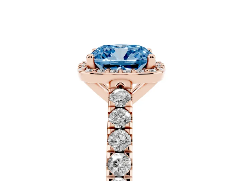 Fancy Blue Cushion Cut Diamond Halo Engagement Ring Set in Rose gold with Pavé Band and Prong Setting
