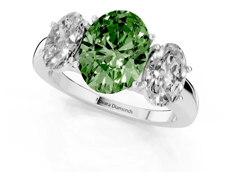 Fancy Green Oval Cut Diamond Three-Stone Ring Set in Silver with Bold Center and Classic Band
