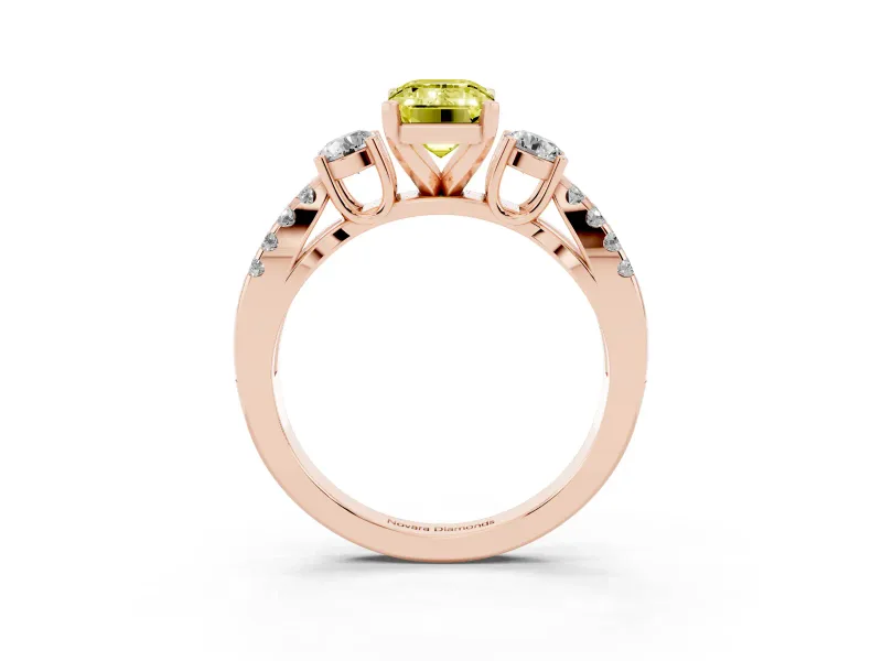 Fancy Yellow Emerald Cut Diamond Three-Stone Ring Set in Rose gold with Pavé Split Shank and Prong Setting