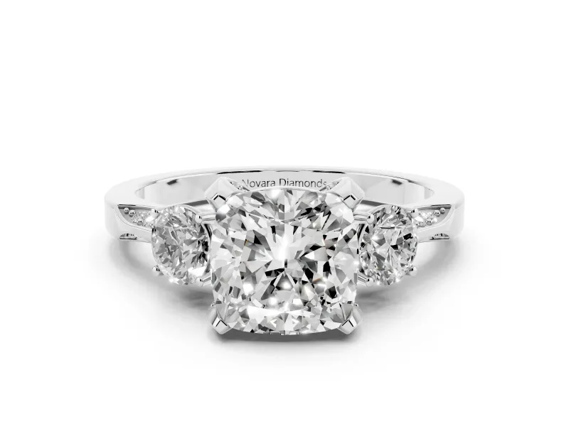 Cushion Cut Diamond Three-Stone Ring Set in Silver with Pavé Band and Smaller Side Stones