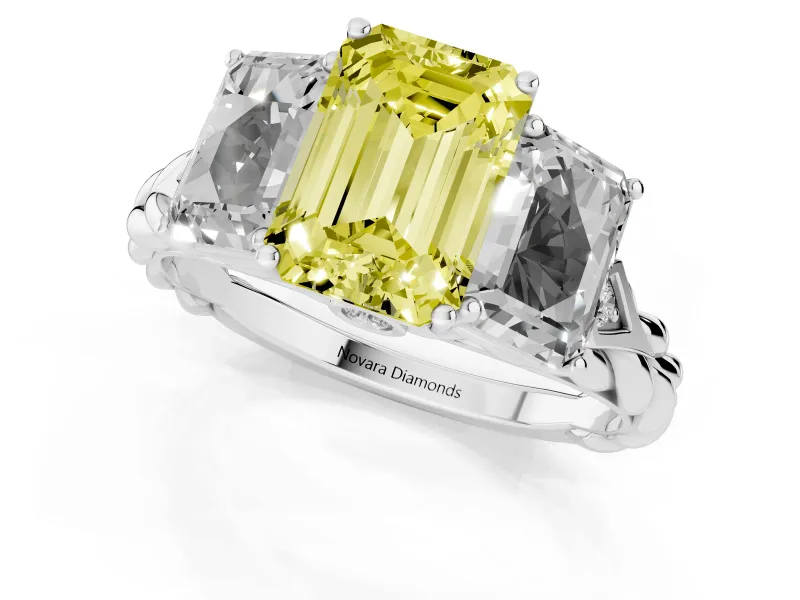 Fancy Yellow Emerald Cut Diamond Three-Stone Ring Set in Platinum with Braided Band