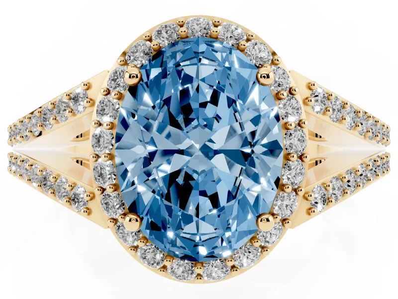 Fancy Blue Oval Cut Diamond Halo Split Shank Pavé Ring Set in Yellow gold with Prong Setting
