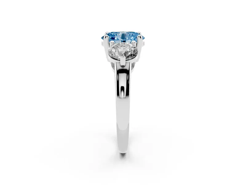 Fancy Blue Oval Cut Diamond Three-Stone Ring Set in Silver with Prong Setting and Classic Band