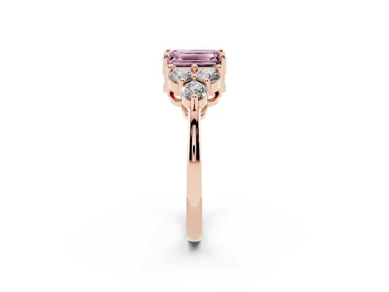 Fancy Pink Emerald Cut Diamond Solitaire Ring Set in Rose gold with Cluster Accents on Each Side