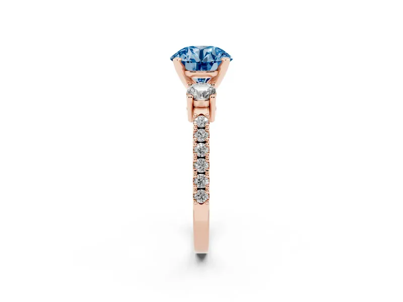 Fancy Blue Three-Stone Round Cut Diamond Pavé Band Ring Set in Rose gold with Prong Setting