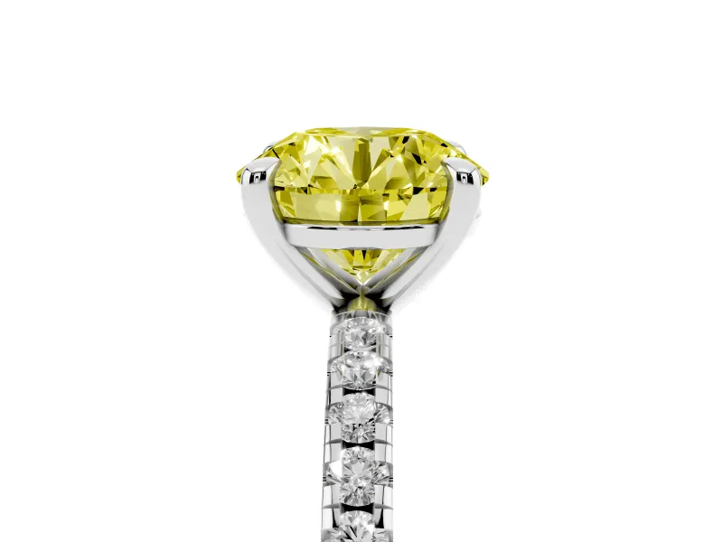 Fancy Yellow Round Cut Diamond Brilliant Solitaire Ring Set in White gold with Pavé Band and Prong Setting