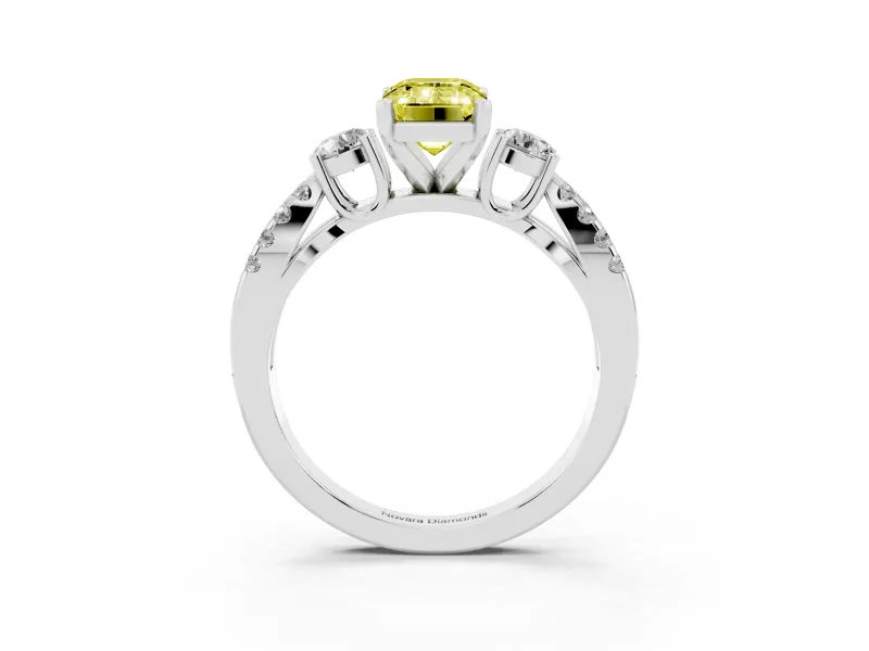 Fancy Yellow Emerald Cut Diamond Three-Stone Ring Set in White gold with Pavé Split Shank and Prong Setting