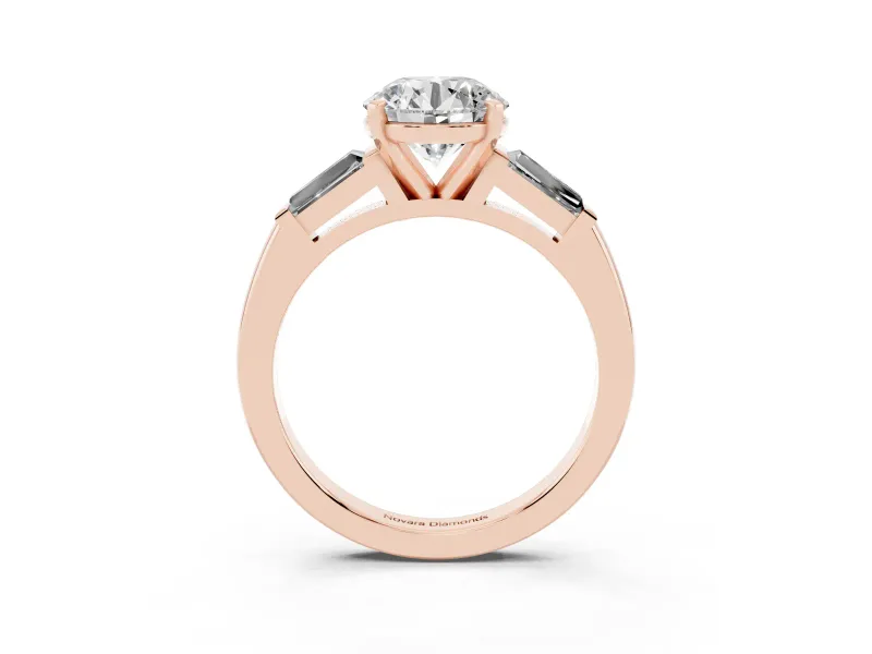 Round Cut Diamond Solitaire Ring Set in Rose gold with Tapered Baguette Side Stones and Prong Setting