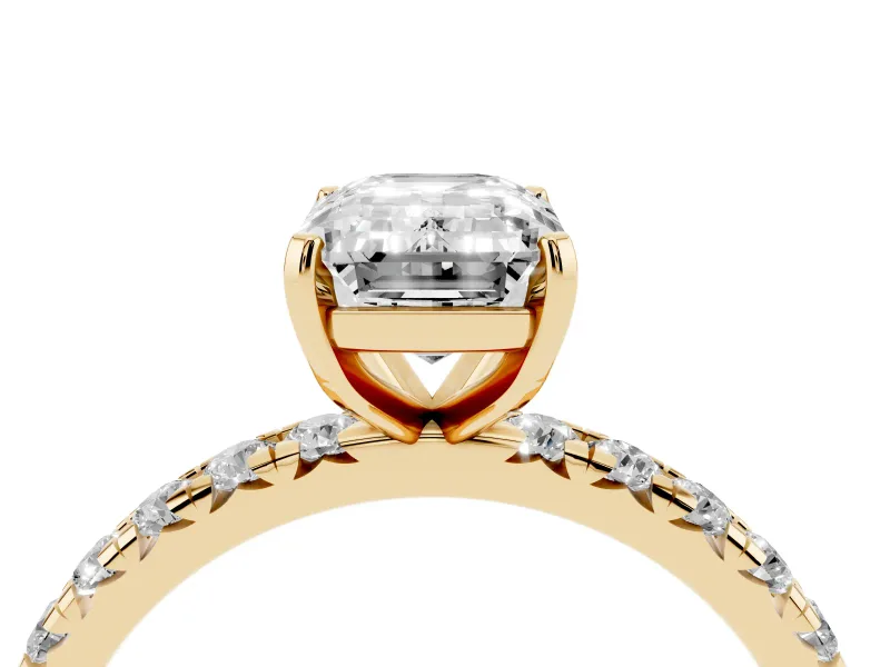 Emerald Cut Diamond Pavé Solitaire Ring Set in Yellow gold with Round Band and Prong Setting