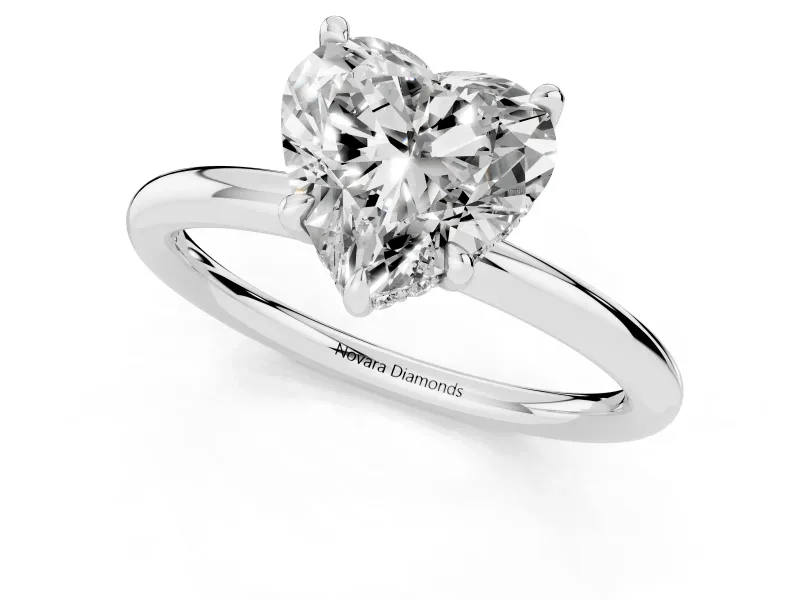 Heart Cut Diamond Solitaire Ring Set in Platinum with Thin Band and Prong Setting