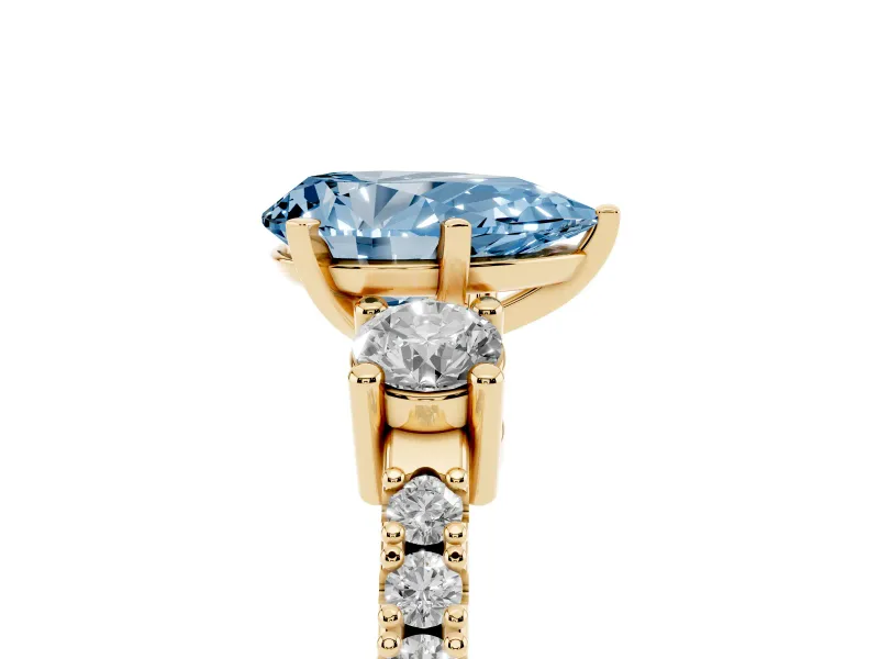 Fancy Blue Three-Stone Pear Cut Diamond Pavé Band Ring Set in Yellow gold with Prong Setting