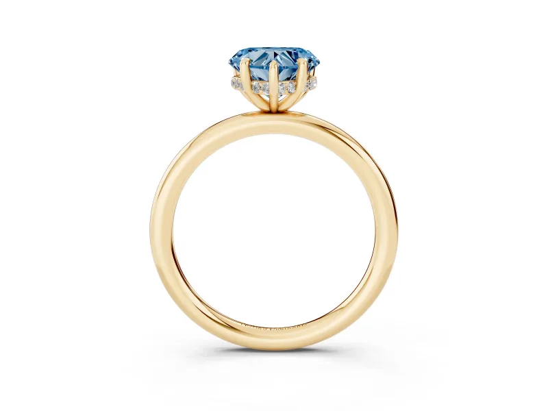 Fancy Blue Heart Cut Diamond Solitaire Ring Set in Yellow gold with Thin Band and Prong Setting