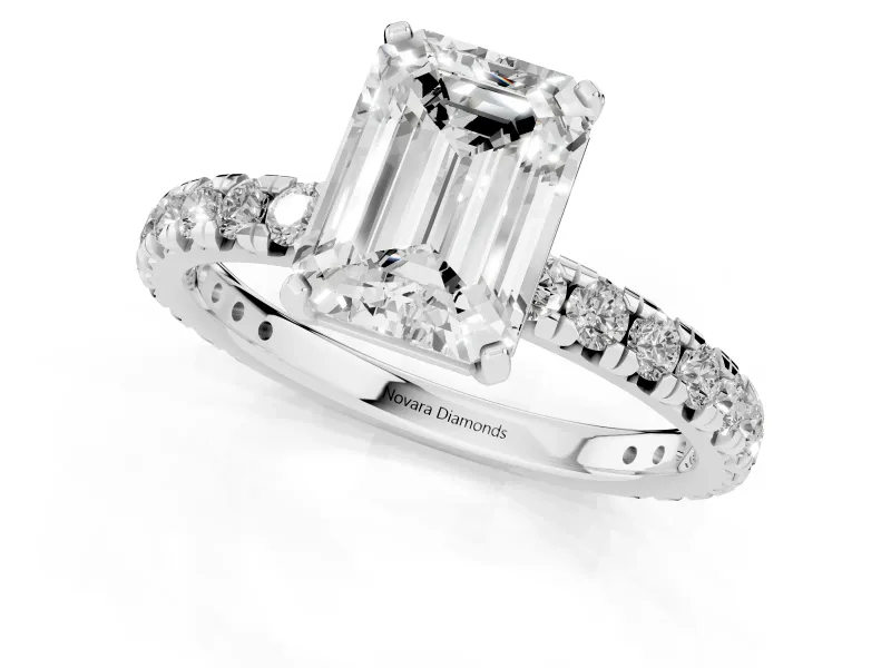 Emerald Cut Diamond Pavé Solitaire Ring Set in Platinum with Round Band and Prong Setting