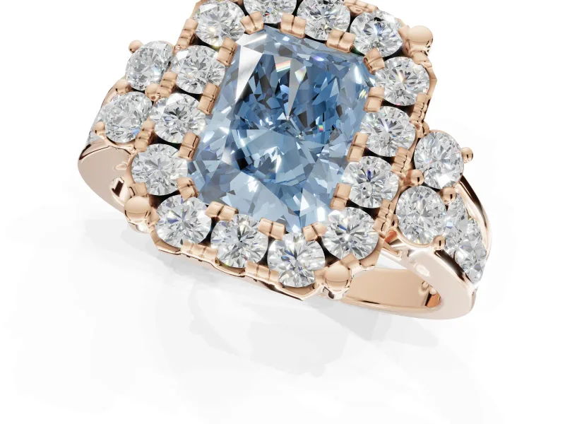 Radiant Cut Halo Engagement Ring Setting for a Fancy Blue Lab-Grown Diamond | Graduated Channel Band | Rose Gold