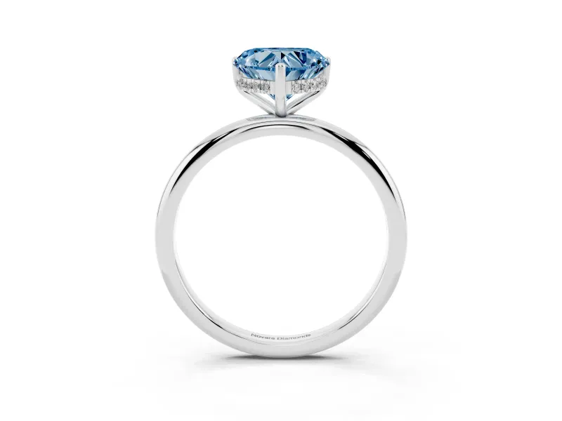 Fancy Blue Heart Cut Diamond Solitaire Engagement Ring Set in Platinum with Prong Setting and Polished Band