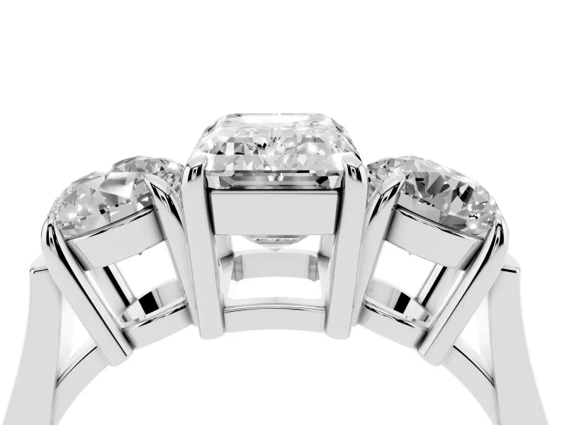 Emerald Cut Diamond Three-Stone Ring Set in Platinum with Round Accent Stones and Plain Band