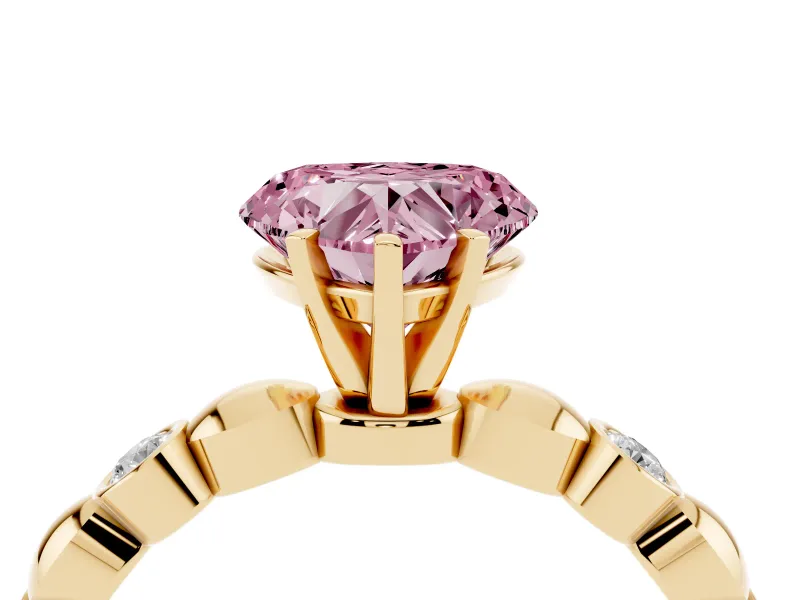 Fancy Pink Heart Cut Diamond Solitaire Ring Set in Yellow gold with Bezel-Set Accents on Beaded Band and Prong Setting