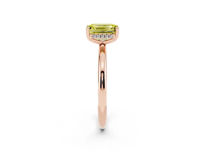 Fancy Yellow Emerald Cut Diamond Solitaire Engagement Ring Set in Rose gold with Prong Setting and Polished Band