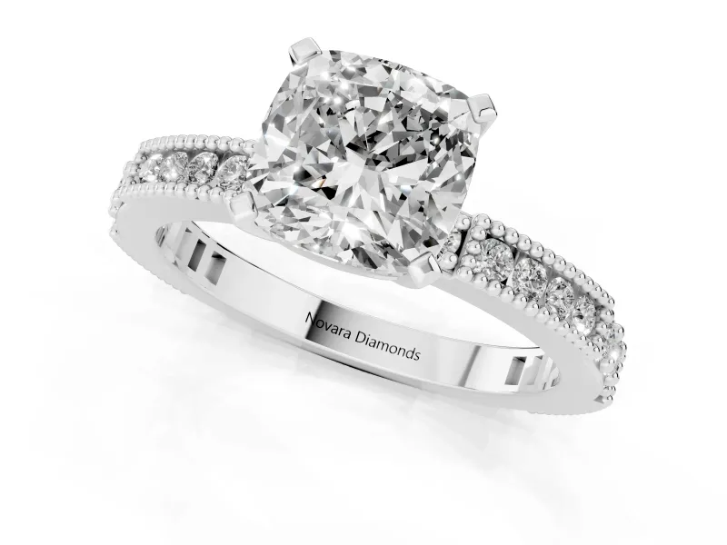 Cushion Cut Diamond Solitaire Ring Set in White gold with Slim Pavé Band and Prong Setting