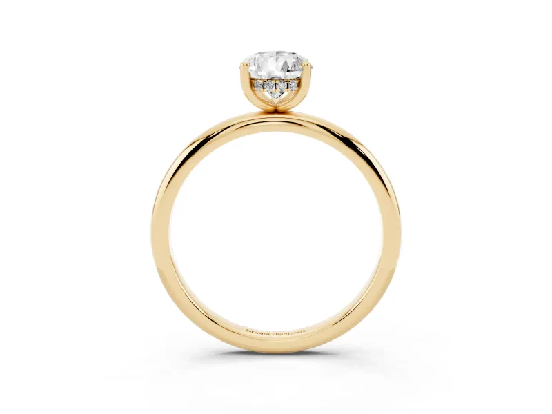 Pear Cut Diamond Solitaire Engagement Ring Set in Yellow gold with Prong Setting and Polished Band