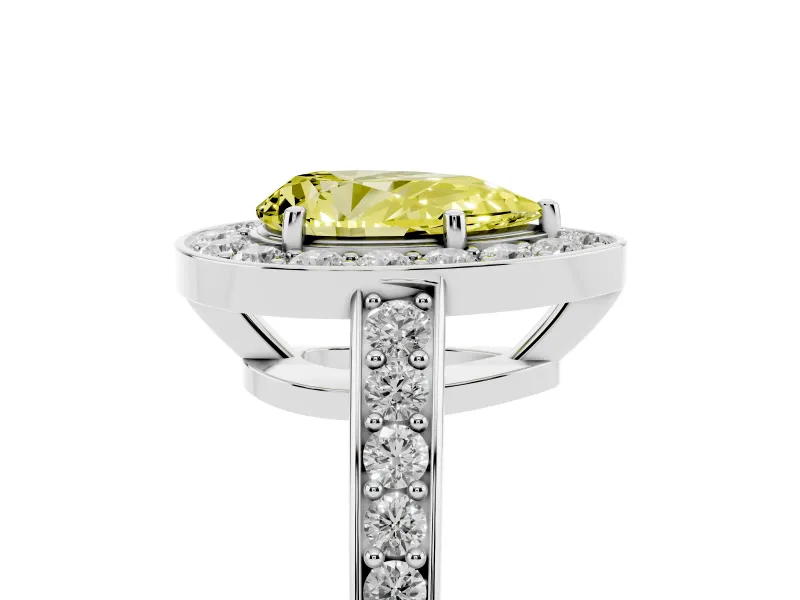 Fancy Yellow Pear Cut Diamond Halo Pavé Engagement Ring Set in Silver with Bezel Setting