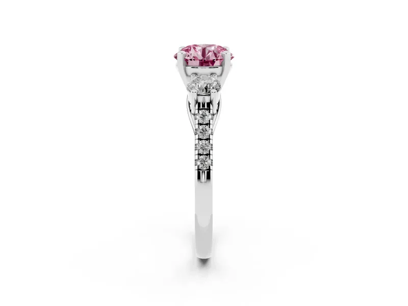 Fancy Pink Three-Stone Round Cut Diamond Pavé Band Ring Set in Platinum with Prong-Set Trio