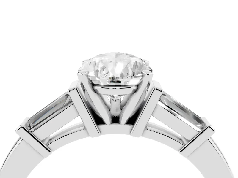 Pear Cut Diamond Solitaire Ring Set in White gold with Tapered Baguette Accents and Prong Setting