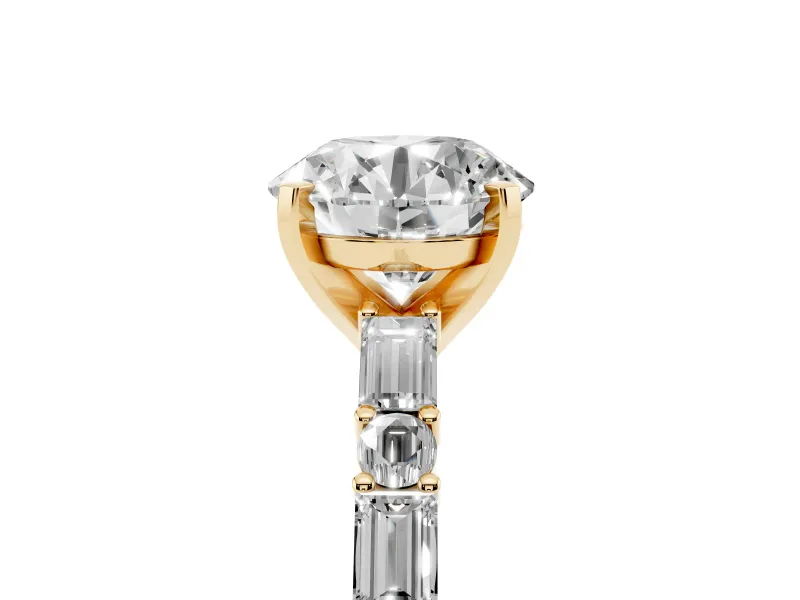 Round Cut Diamond Solitaire Set in Yellow gold with Side Baguettes and Channel Set Band